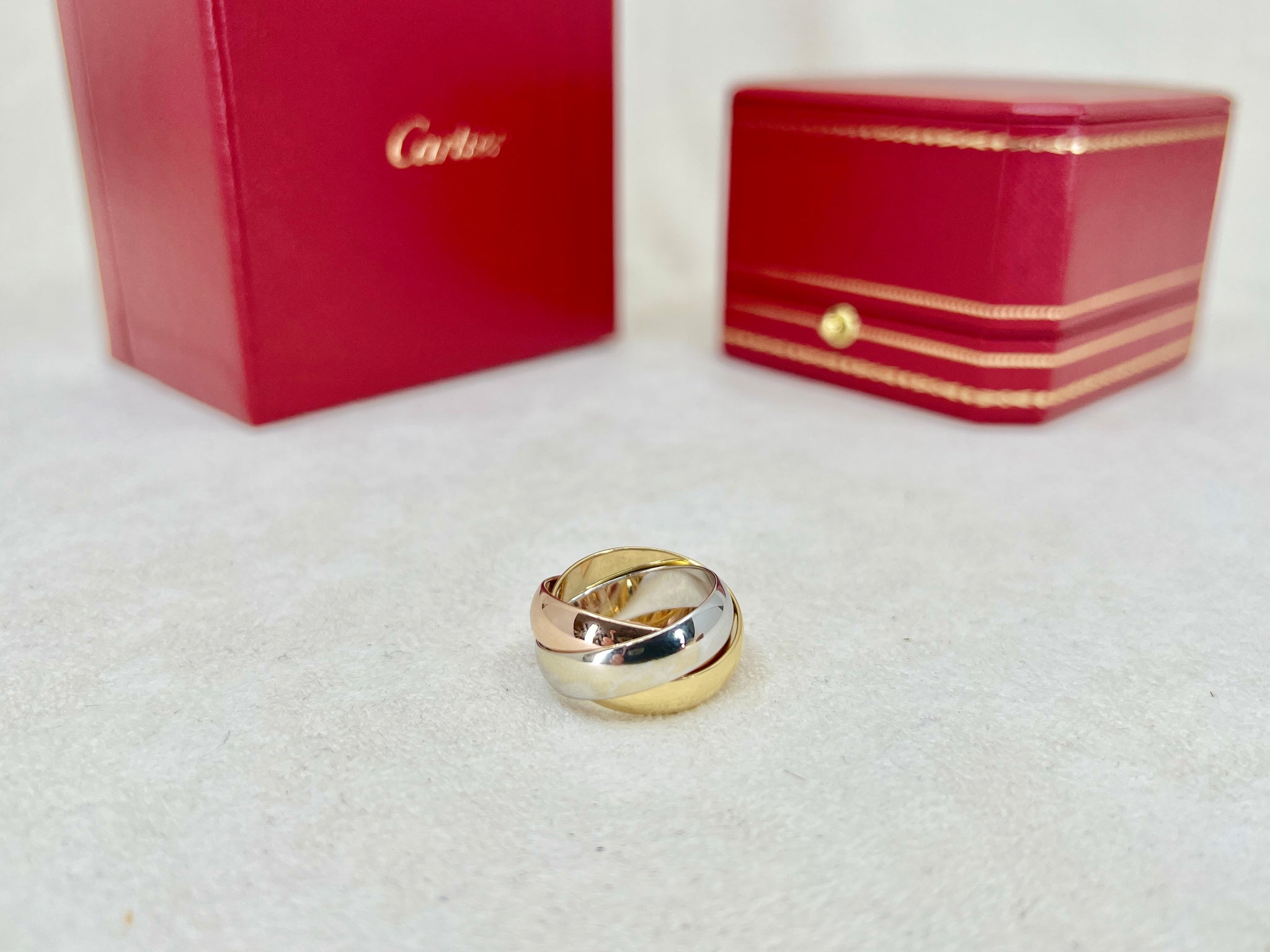 Love Cartier Trinity Tri-Color Spinning Ring 18K White Rose & Yellow Gold  Gold hardware White gold Pink gold ref.409867 - Joli Closet